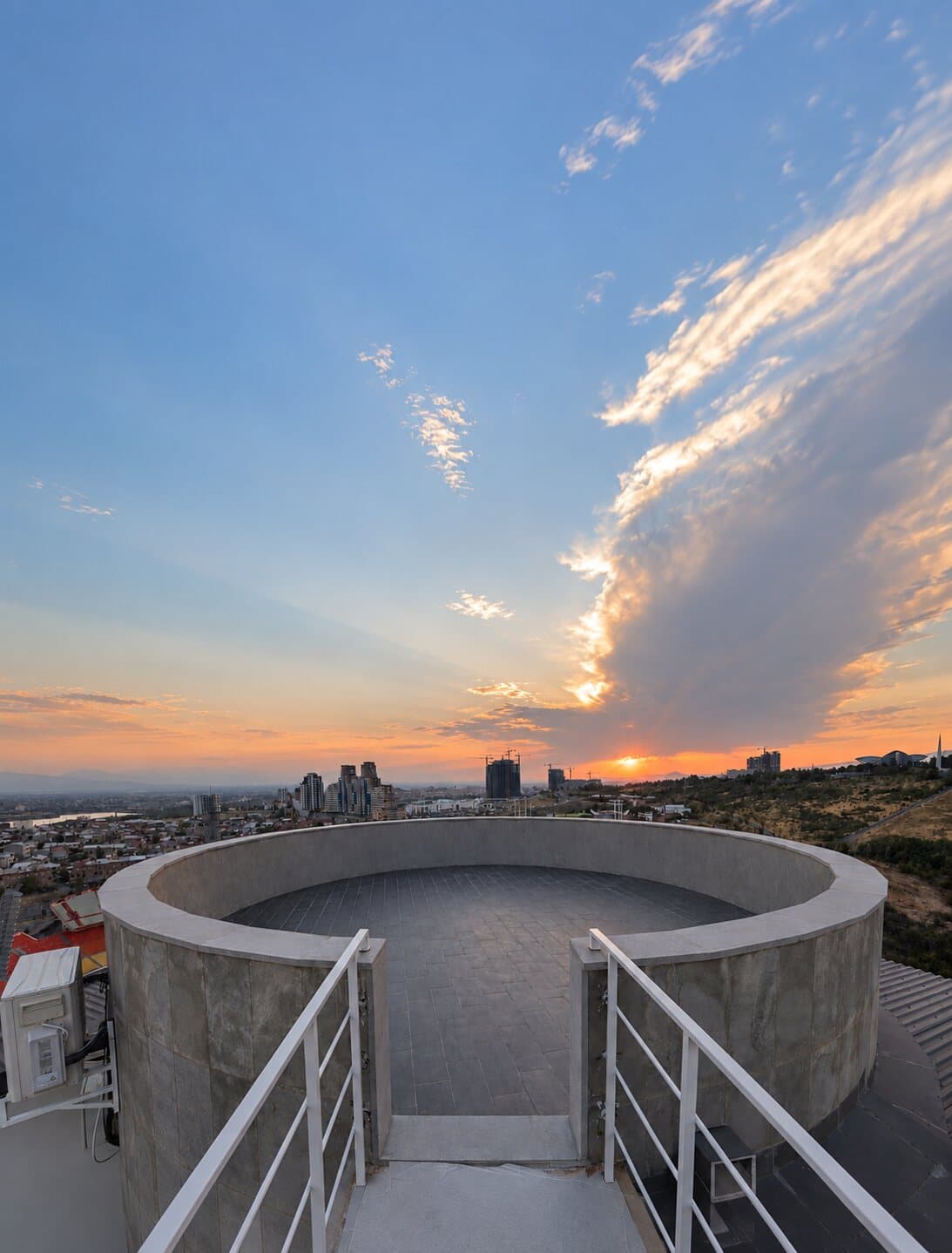 The rooftop platform and evening sky