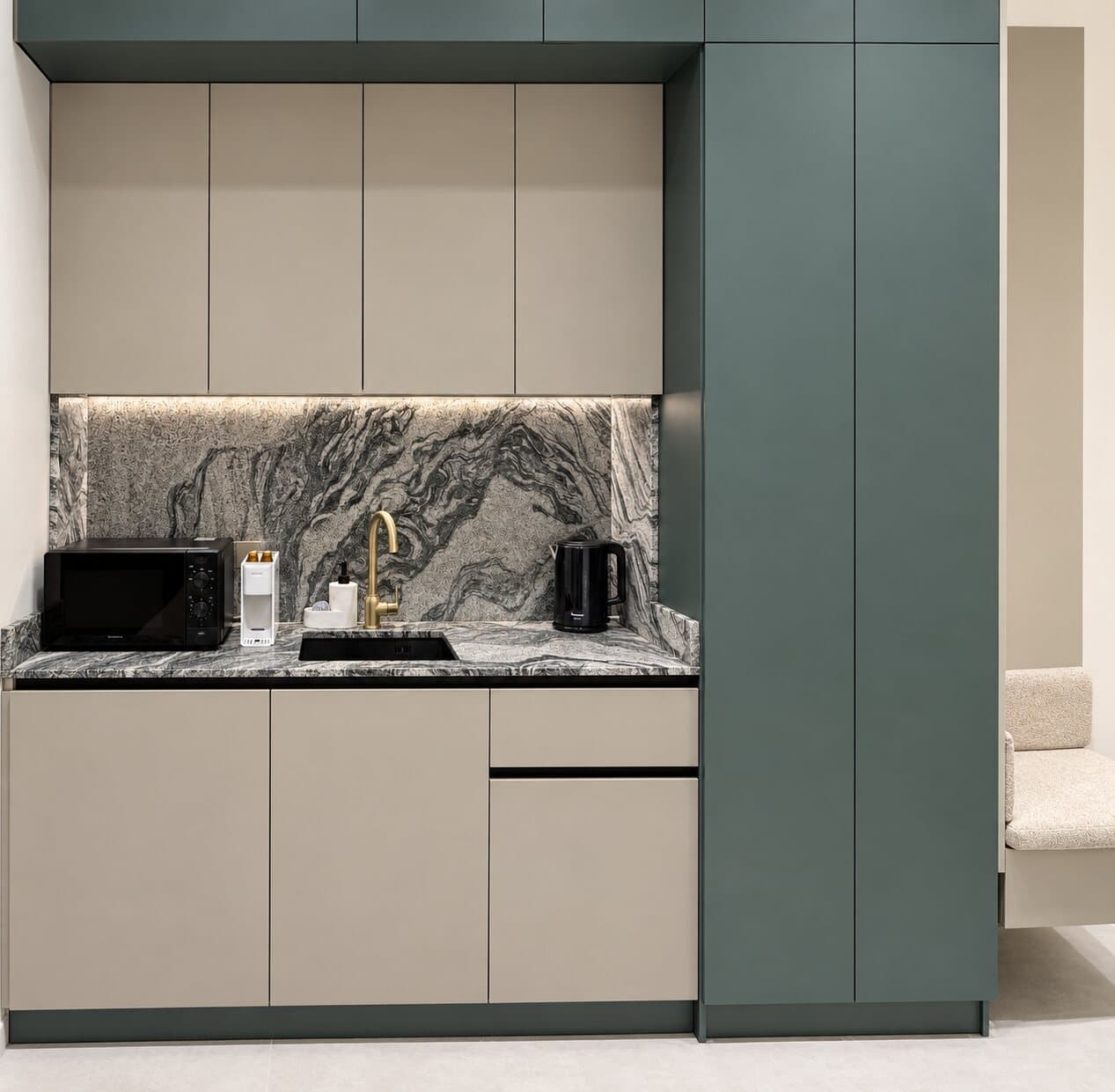 Kitchenette with a marble backsplash