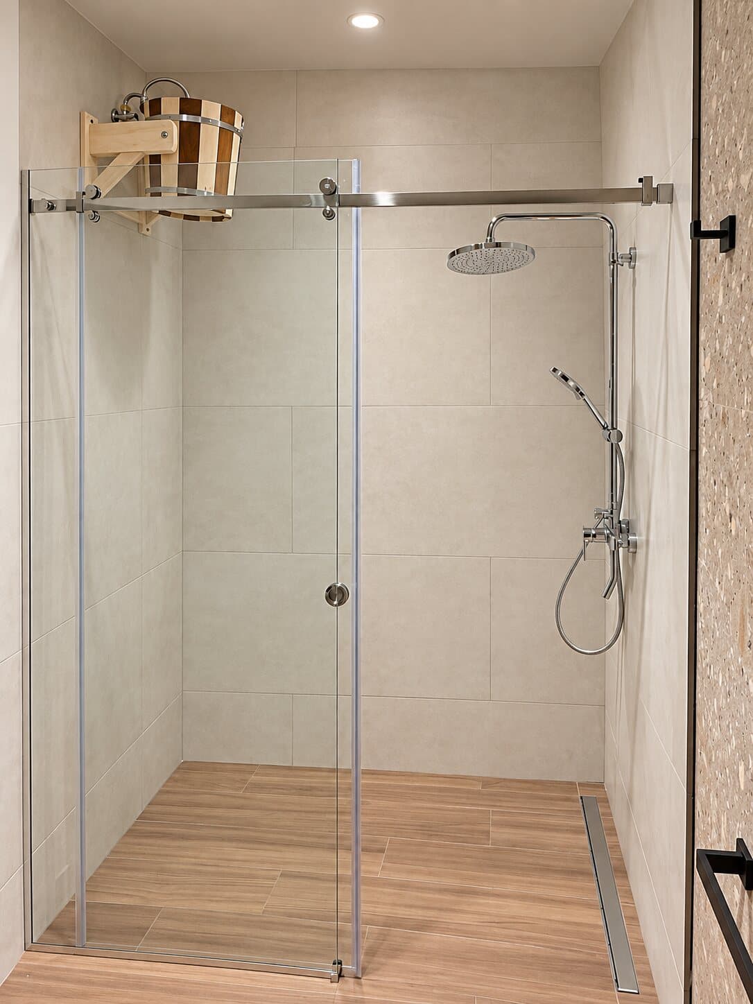 Walk-in shower with a rain shower head